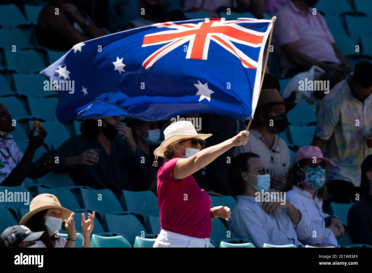 Sydney, Australia. 10th Jan, 2021. A fan waves the Australian flag during  Day 4 of the 3rd International Test Match between Australia and India at  Sydney Cricket Ground, Sydney, Australia on 10