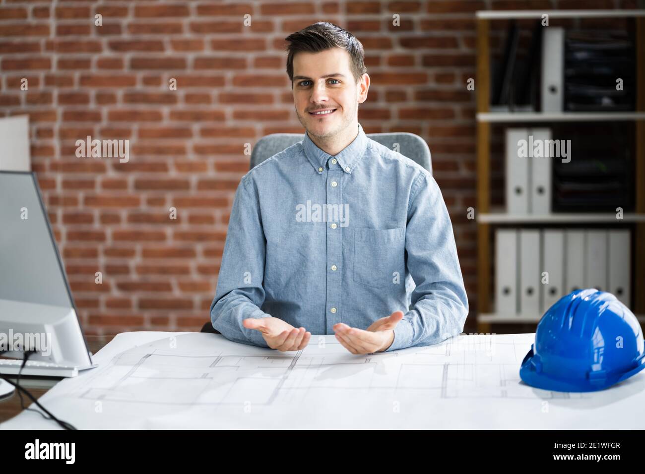 Architect In Online Video Conference Call On Desktop Computer Stock ...