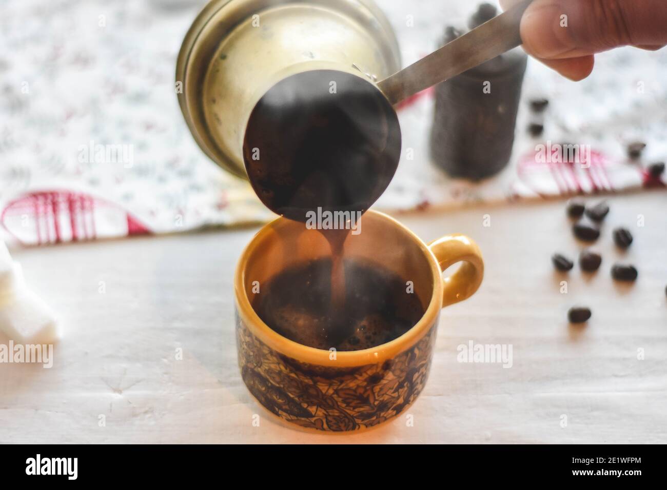 Wake up coffee espresso, Pouring fresh hot black coffee into the cup