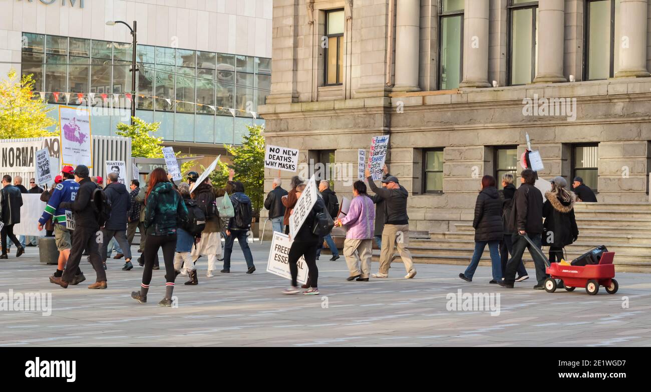 Vancouver, BC, Canada-November 1,2020. Peaceful protest Anti lockdown, anti vaccine and anti mask protesters stage a demonstration. Selective focus, Stock Photo