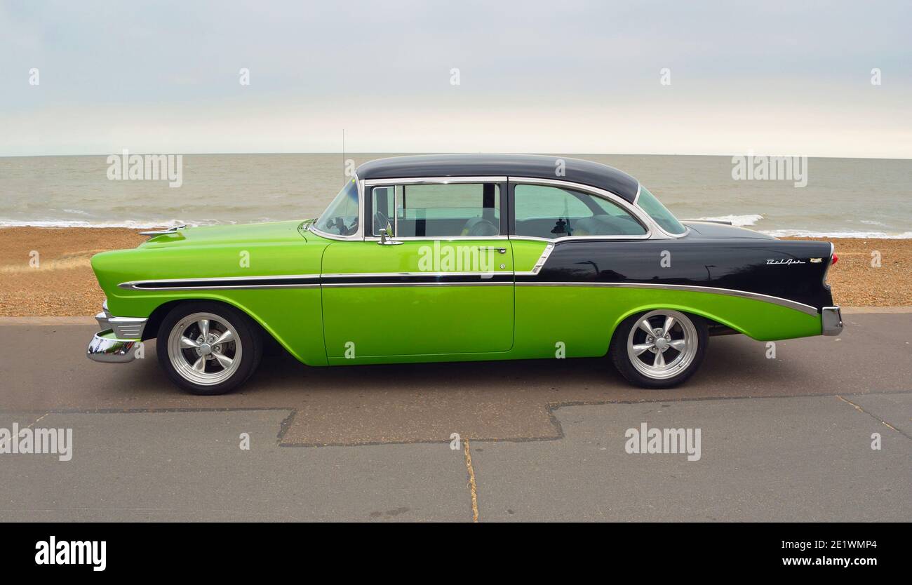 Classic Green and Black Chevrolet  Belair  American Automobile parked  on seafront promenade. Stock Photo