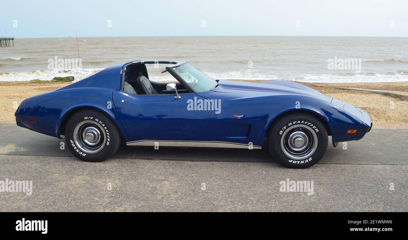 Classic Blue Chevrolet Corvette Sports Car on seafront promenade Stock