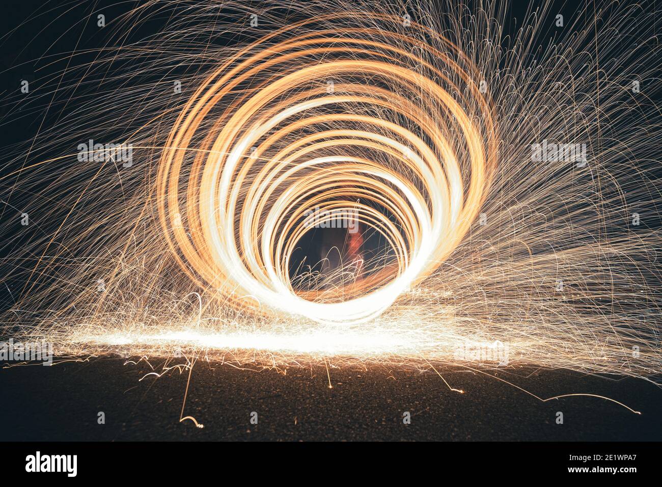 Steel wool photography involves setting light to steel wool and then