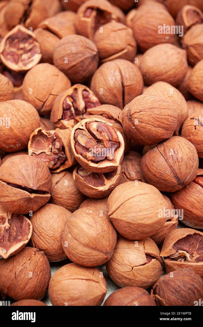 Pile of walnuts background Stock Photo