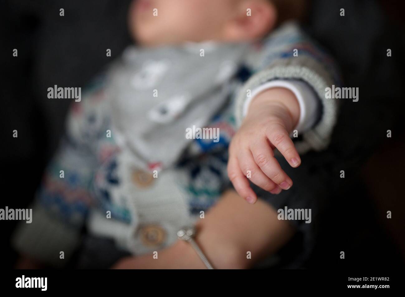 Closeup of sweet baby's hand - depth of field Stock Photo