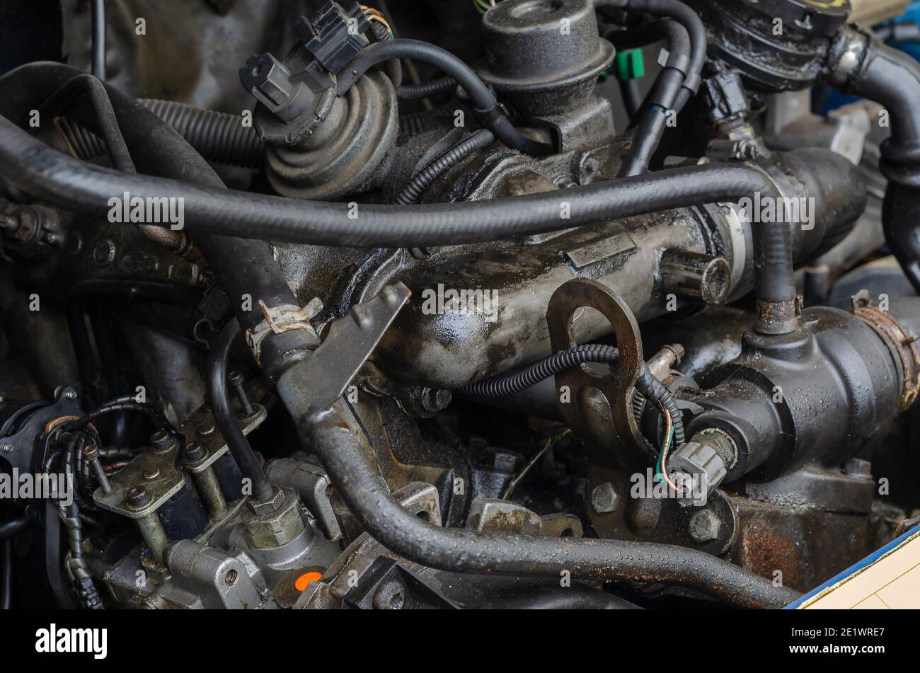 Car repair, car service concept. Fragment of engine compartment of