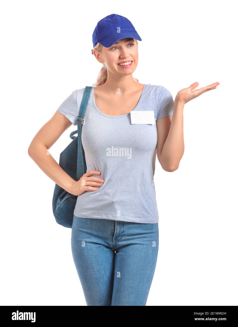 Young woman with blank badge on white background Stock Photo - Alamy