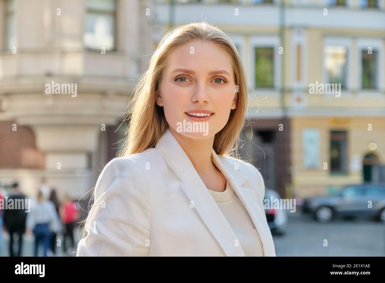 Outdoor portrait of young successful smiling business woman Stock Photo ...