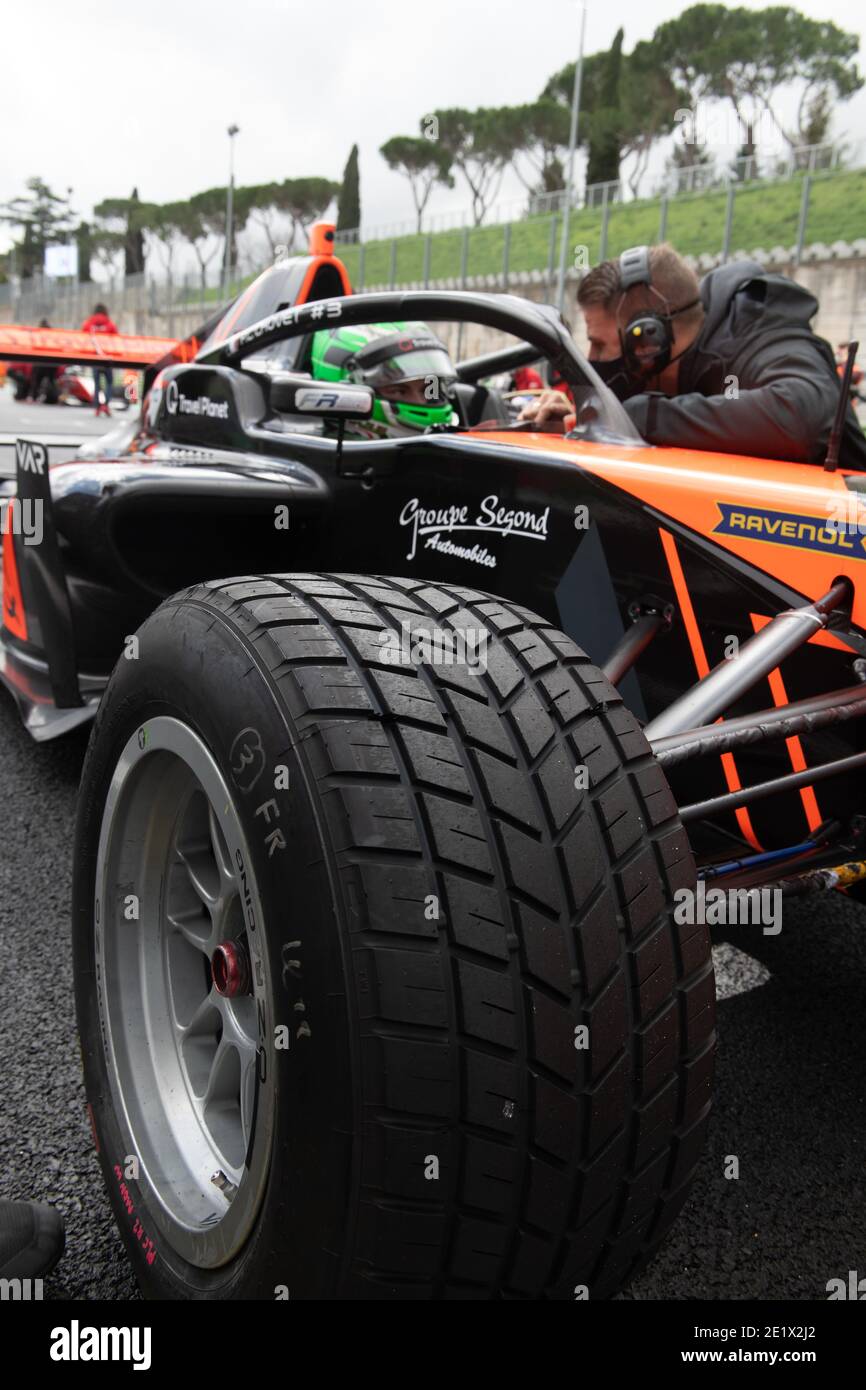 Vallelunga, Italy 5 december 2020, Aci racing weekend. Side view close up of wet tire on formula car racing with driver in cockpit talking with team m Stock Photo