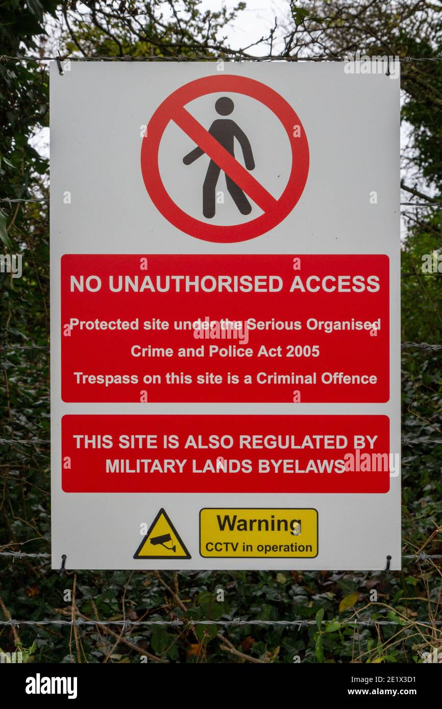 'No Unauthorised Access' sign on the edge of Military land on Salisbury Plain, Wiltshire, UK. Stock Photo