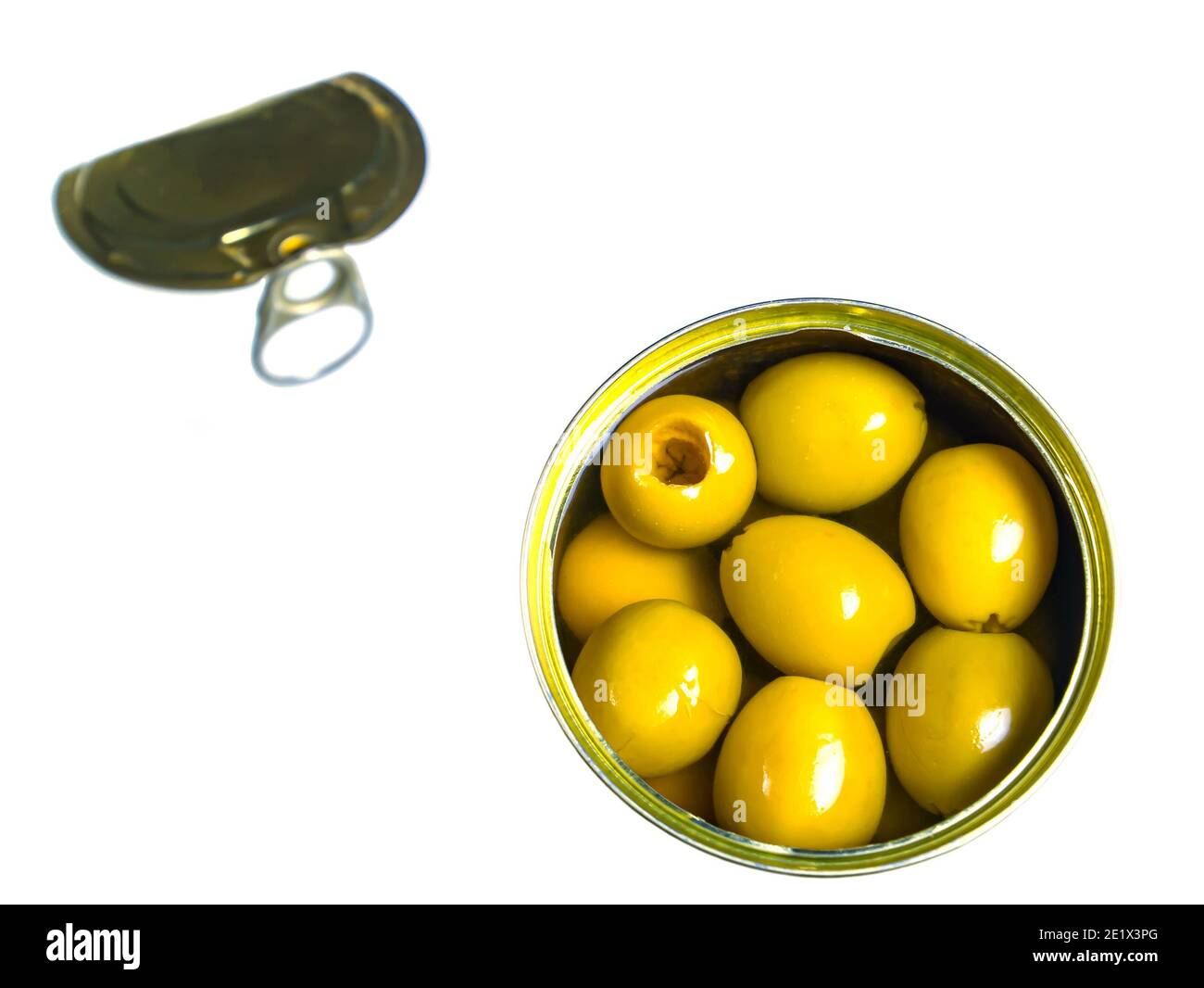 Green olives in a tin can on a white background. Green olive fruits. Olives berries. Olive