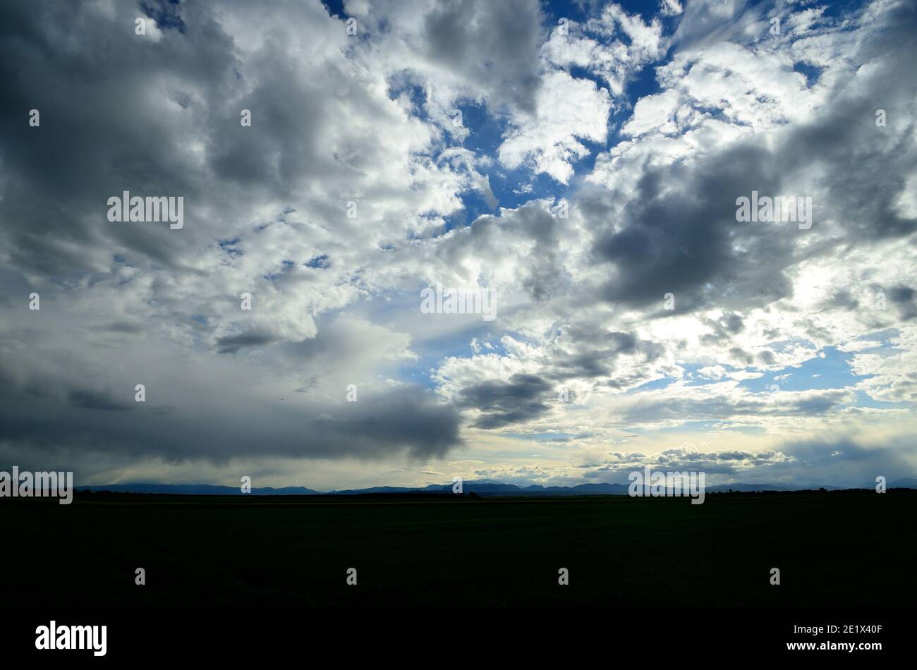 Many clouds in the sky hi-res stock photography and images - Alamy
