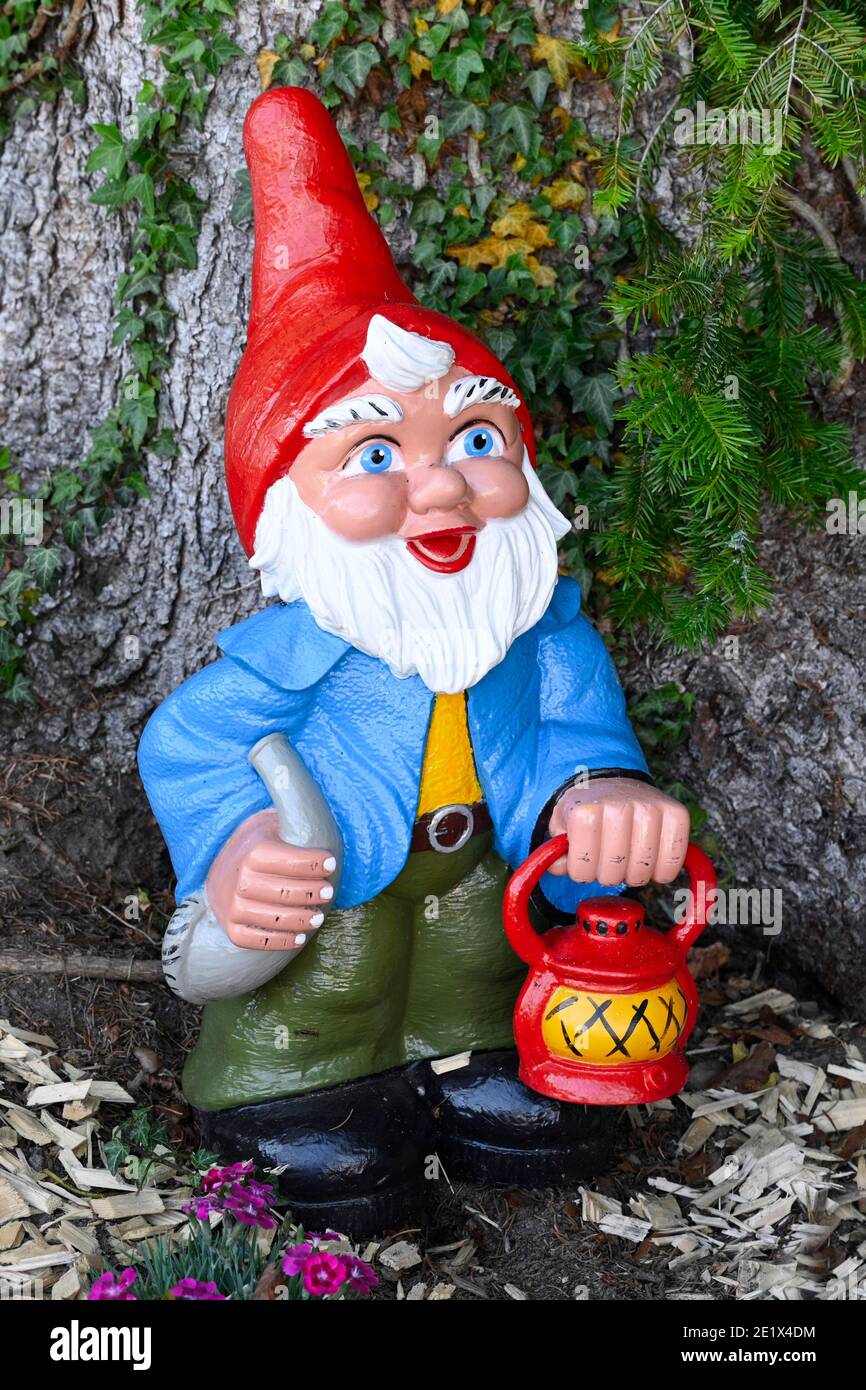 Garden gnome with lantern Stock Photo Alamy