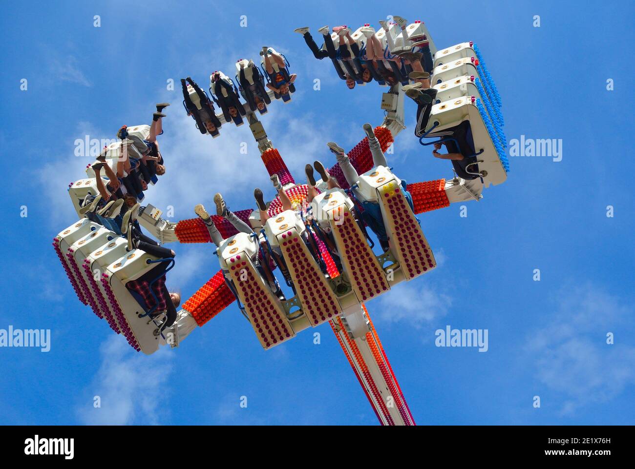 Fair Ground  ride filled  with thrill seekers Stock Photo