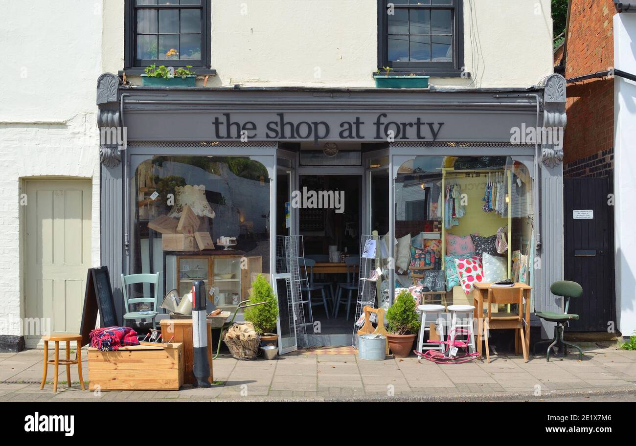 Store front of The Shop at Forty which sells Retro and Vintage wares with stock outside on the pavement. Stock Photo
