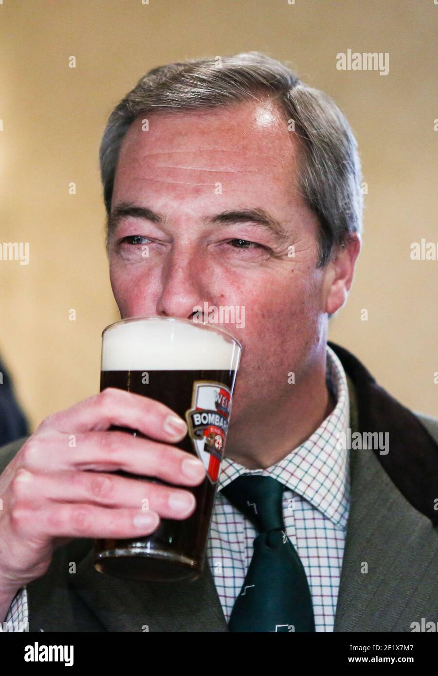05/12/16. Sleaford, UK. Former UKIP leader Nigel Farage drinks a pint of beer in a pub in Sleaford, Lincolnshire, with Victoria Ayling, UKIP's candida Stock Photo
