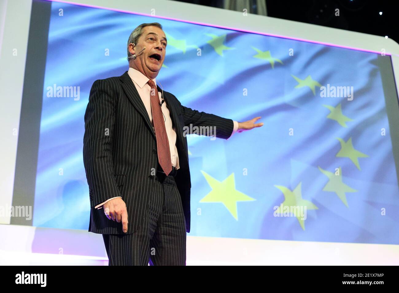 30/11/15. Leeds, UK. UKIP leader Nigel Farage in front of an EU flag during a UKIP event at Leeds United's Elland Road ground in West Yorkshire in the Stock Photo