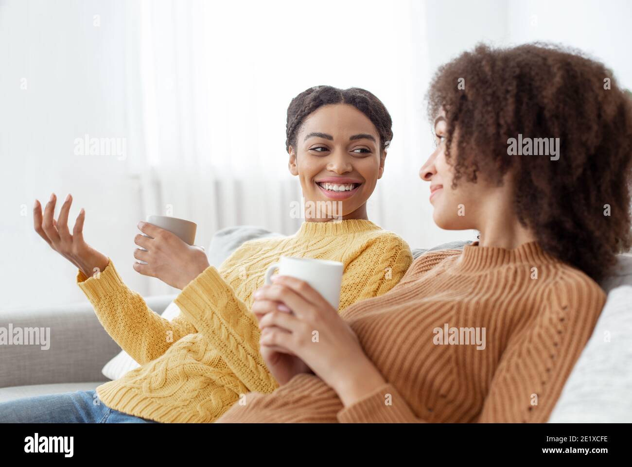 Bachelorette party, gossip and chatter with friend at home Stock Photo