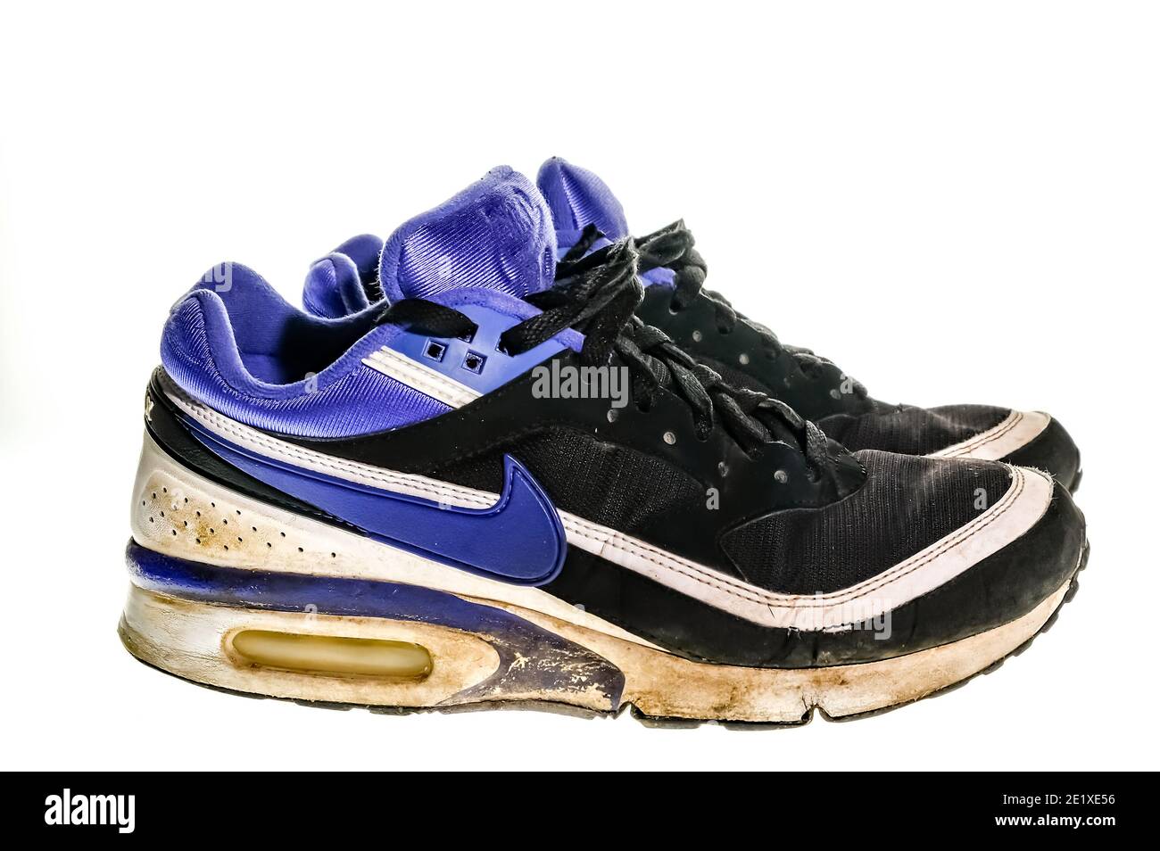 Norwich, Norfolk, UK – December 19 2020. An illustrative photo of a pair of  dirty, old and well worn Nike Air Max Classic trainers in black and purple  Stock Photo - Alamy