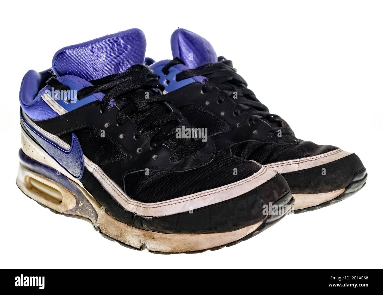 Norwich, Norfolk, UK – December 19 2020. An illustrative photo of a pair of  dirty, old and well worn Nike Air Max Classic trainers in black and purple  Stock Photo - Alamy
