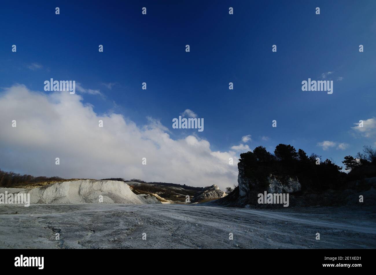 white limestone rocks break with forest and blue sky Stock Photo - Alamy