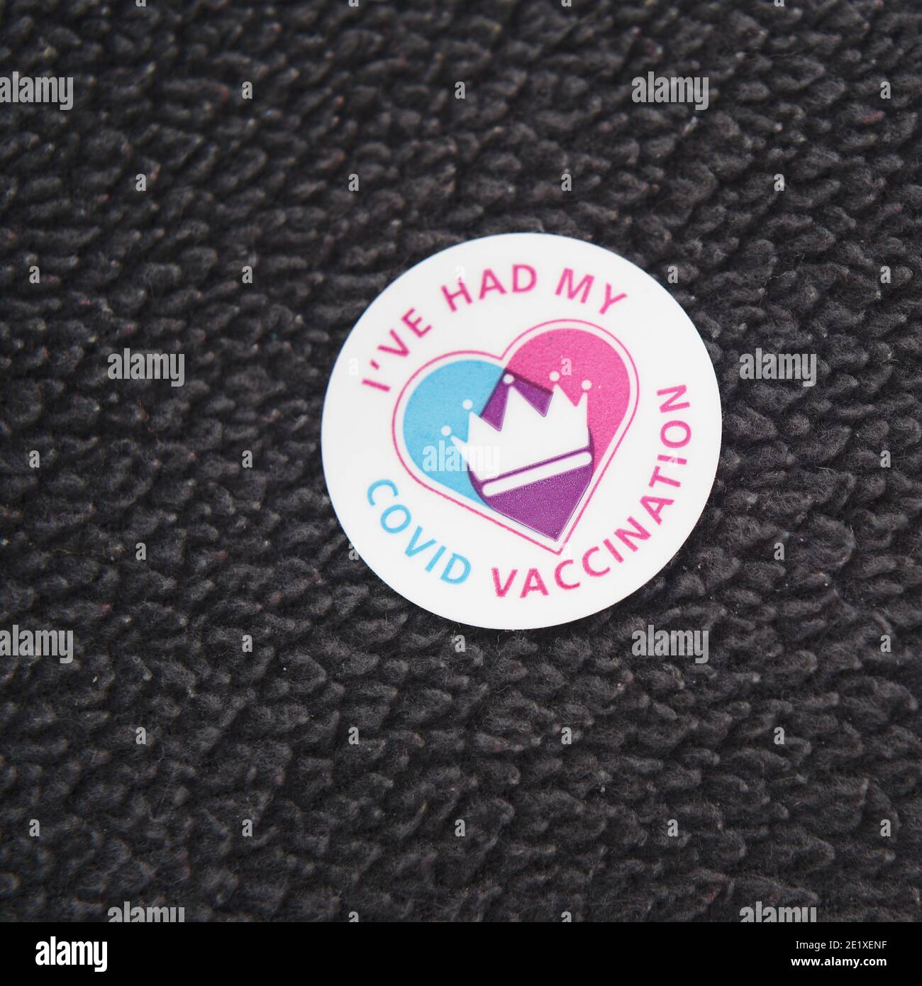 I've had my Covid vaccination sticker on a fleece top after being vaccinated against coronavirus in the UK Stock Photo