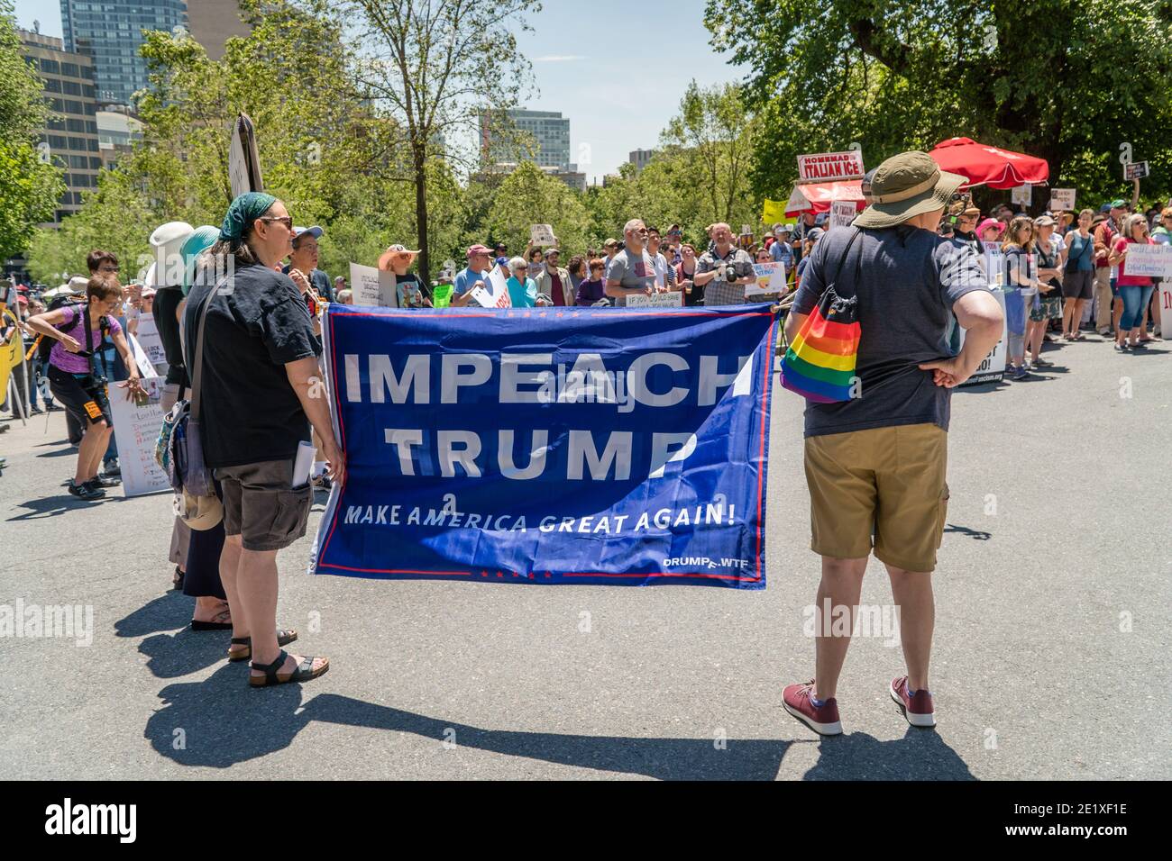 Boston, Massachusetts, US-June 15, 2019: Protesters hold signs reading 'Impeach Trump' Stock Photo