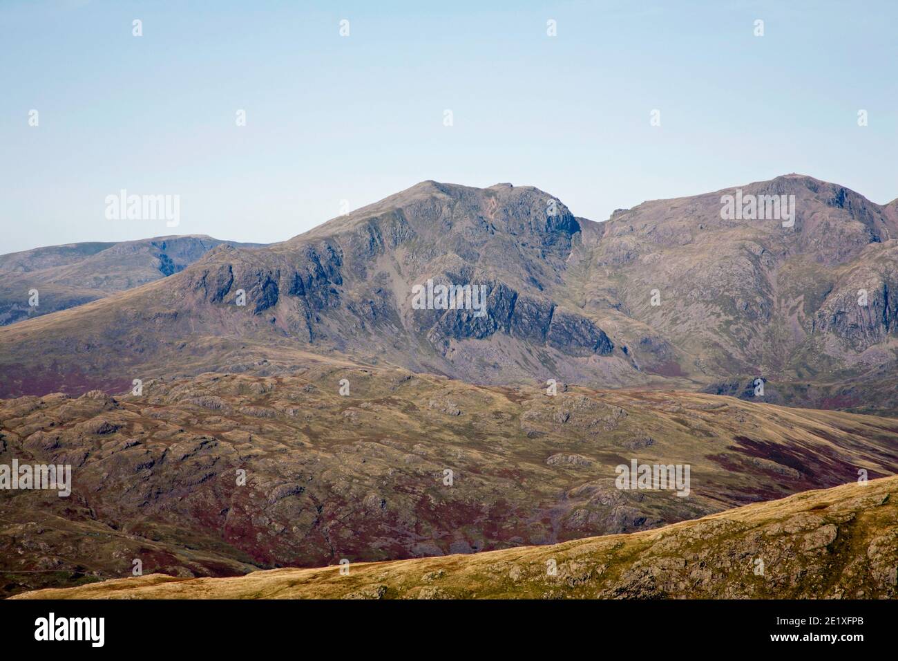 Scafell Pike and Scafell viewed from Goat's Hawse between Dow Crag and The Old Man of Coniston Lake District Cumbria England Stock Photo