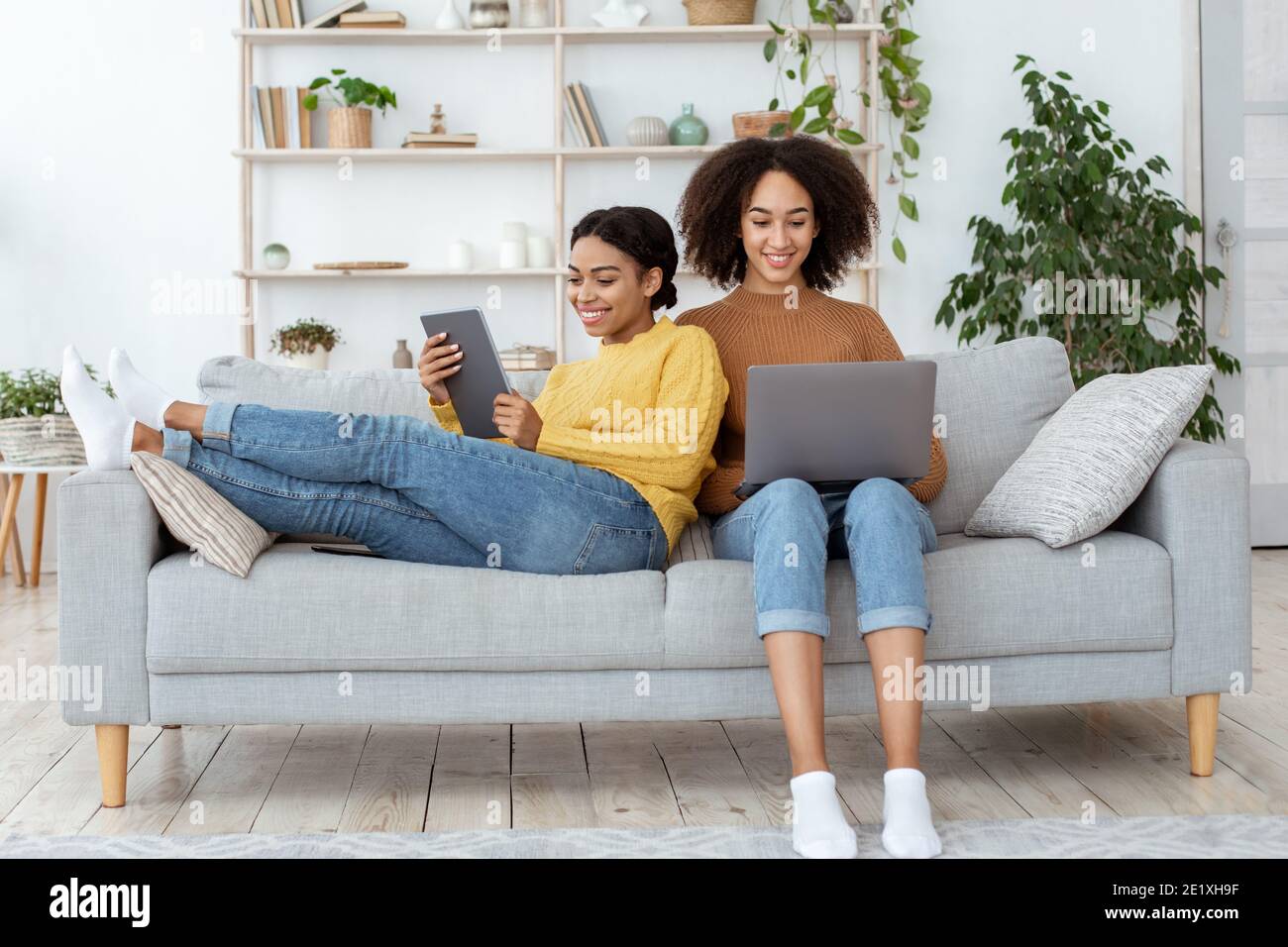 Modern work together at home and surfing on internet in free time Stock Photo