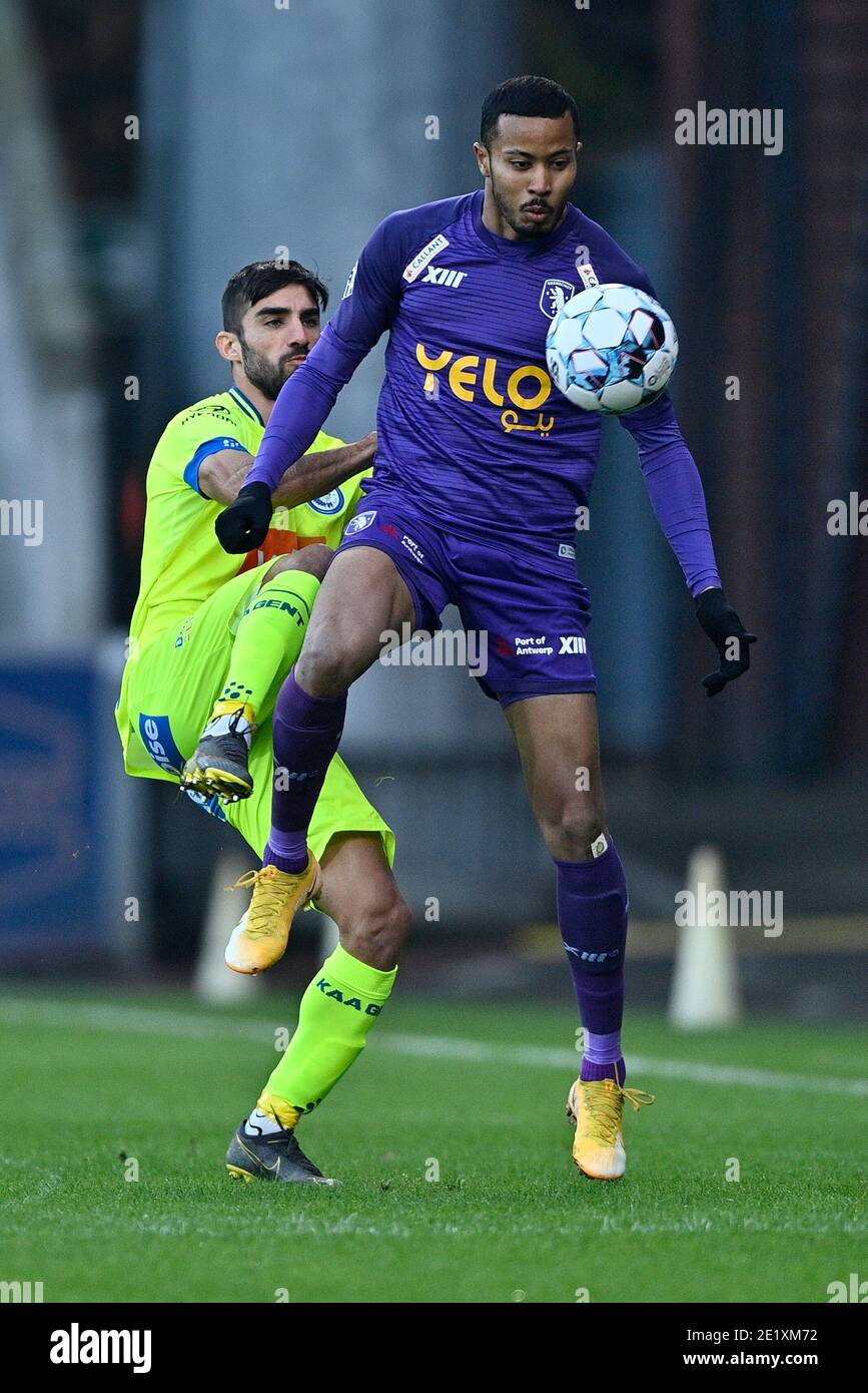 Gent's Milad Mohammadi and Beerschot's Musashi Suzuki fight for the ball during a soccer match between Beerschot VA and KAA Gent, Sunday 10 January 20 Stock Photo