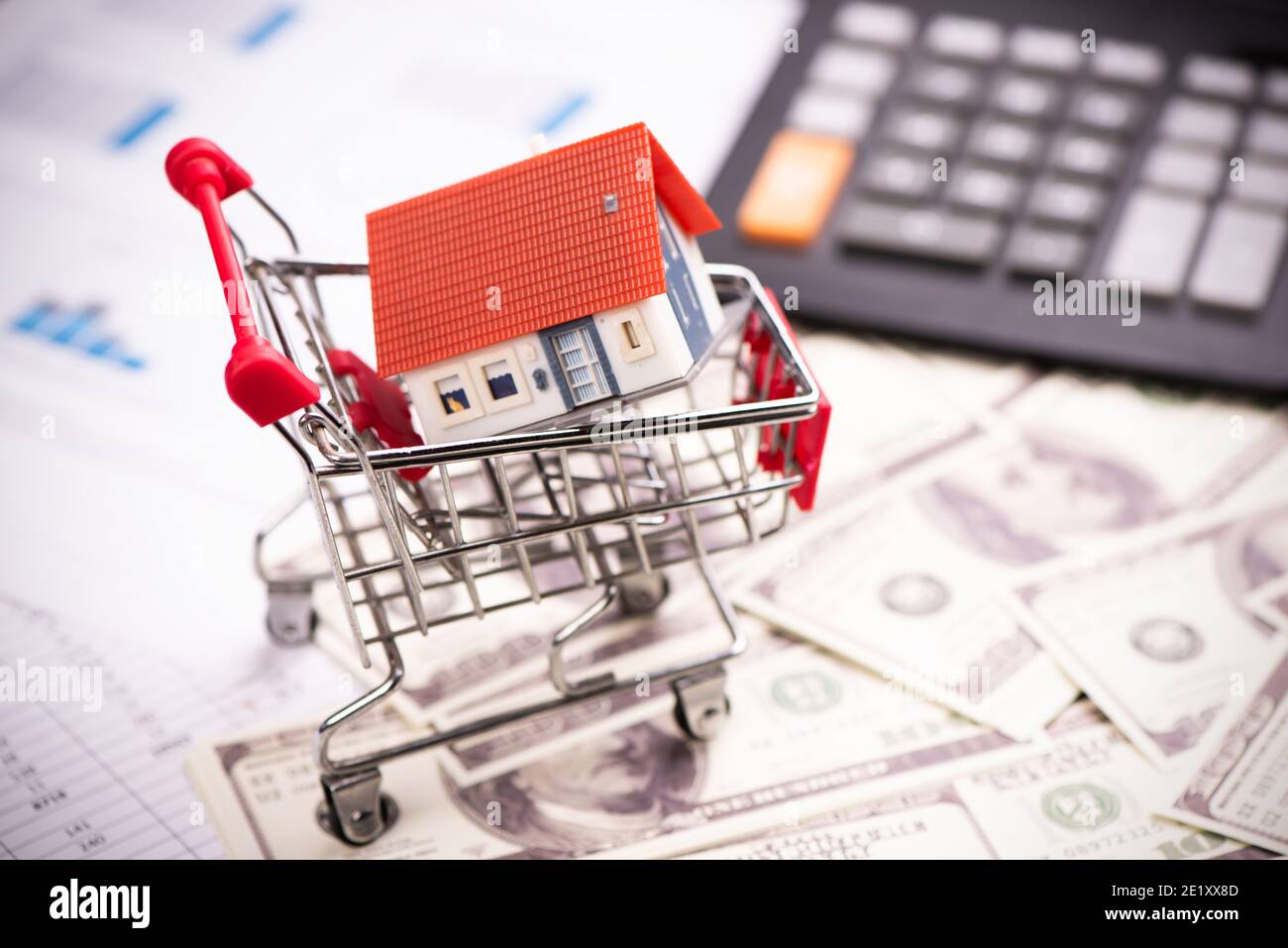 Shopping cart and model of house. Real estate investment trusts Stock