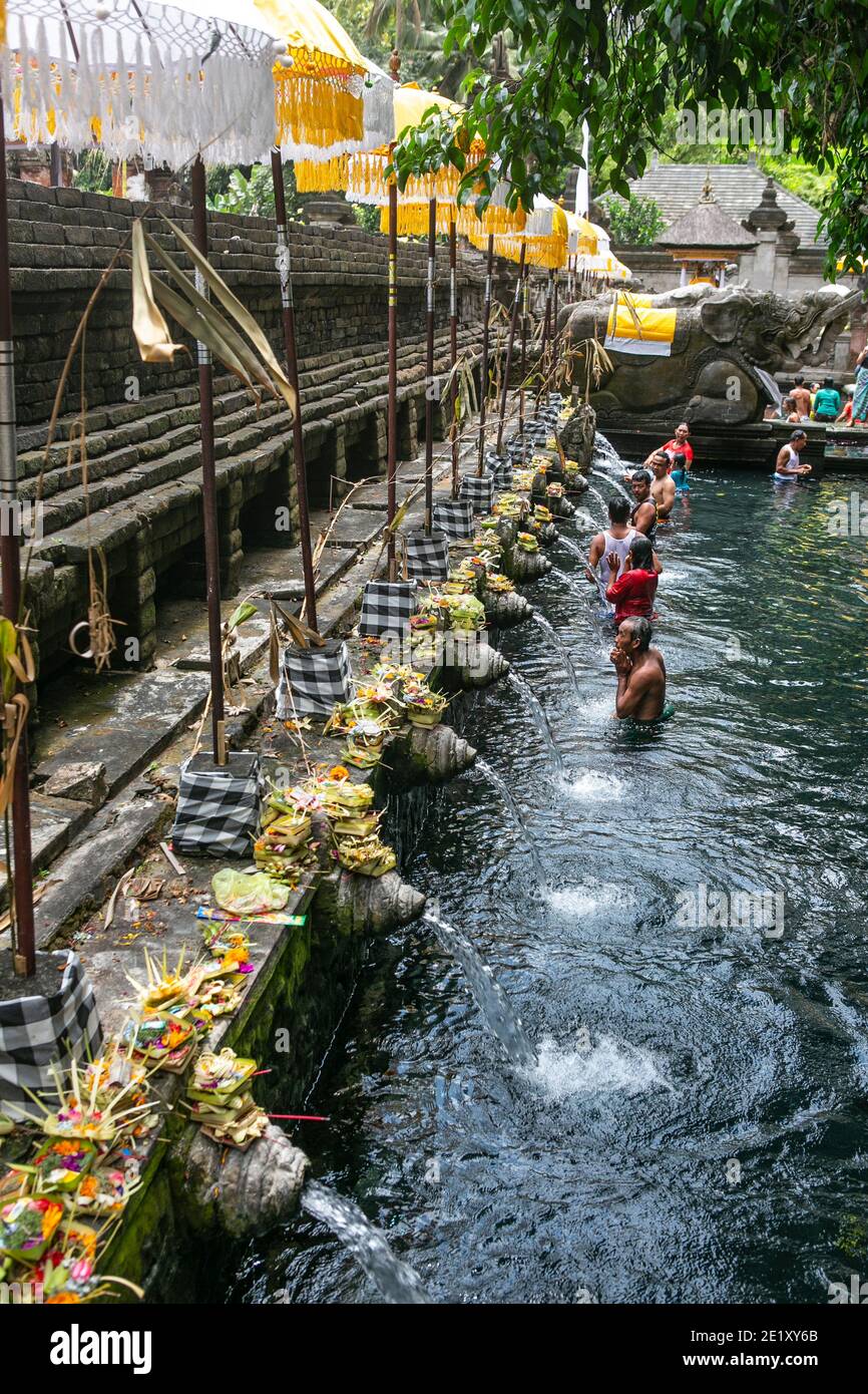 Refreshment in a sacred spring in Bali Island of Indonesia… Stock Photo