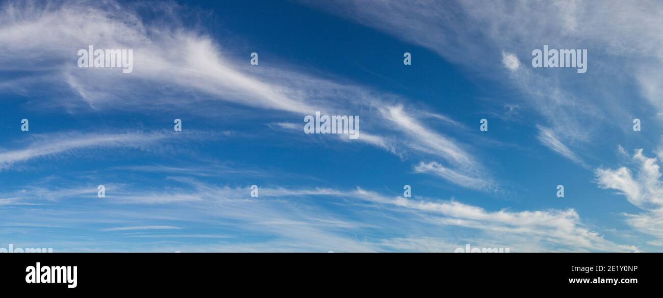 Blue sky with white clouds in a beautiful summer day Stock Photo - Alamy