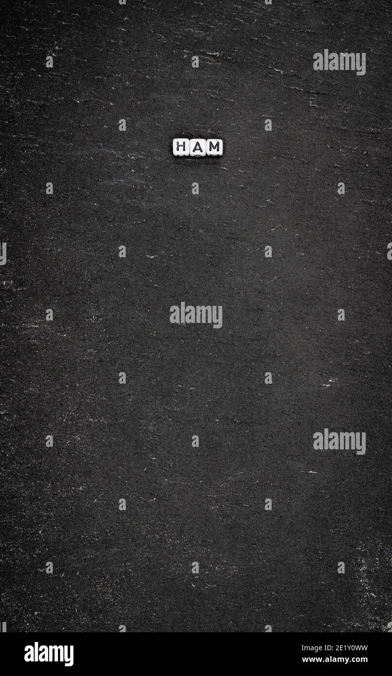 Word ham on black stone background Stock Photo
