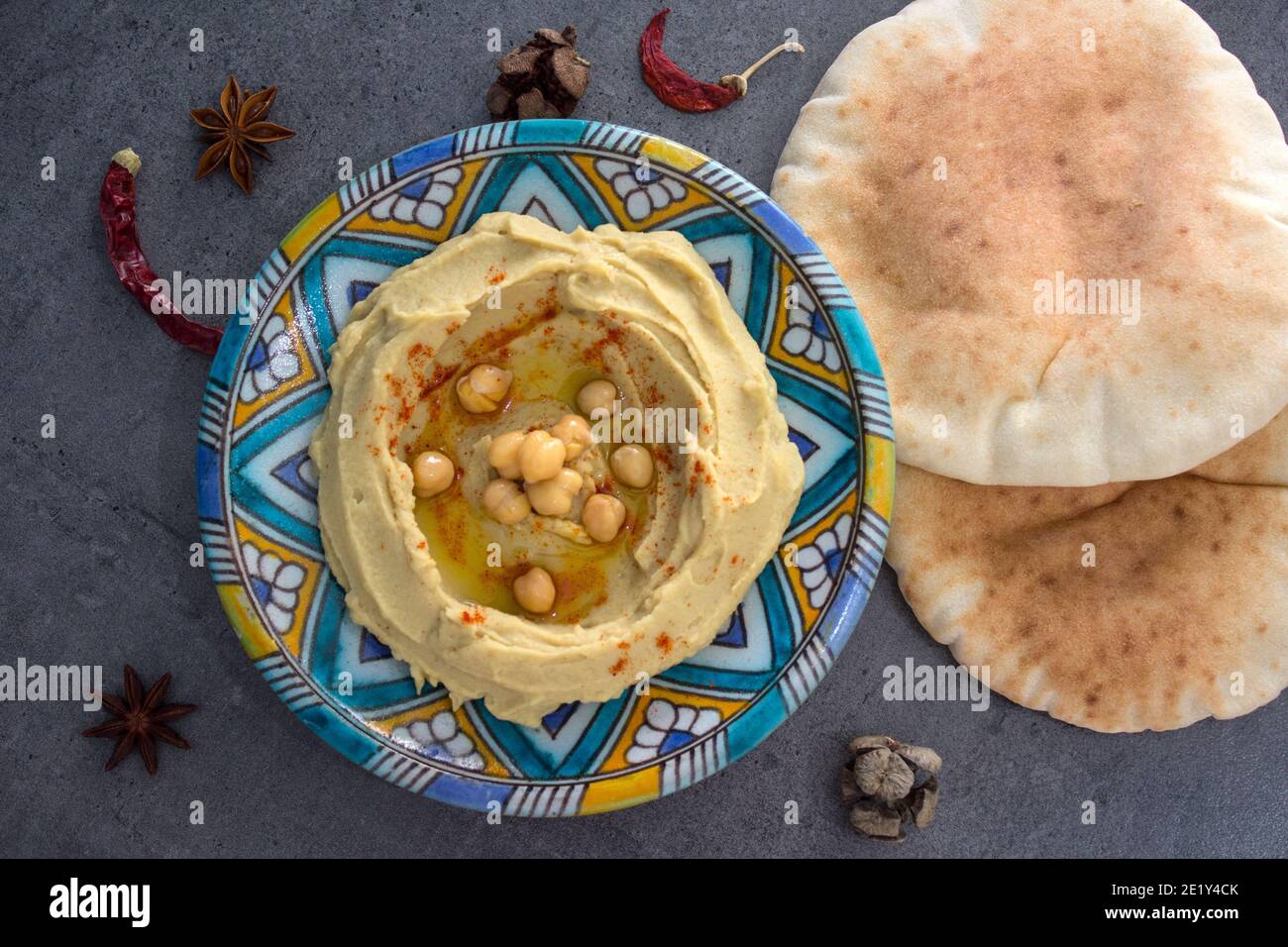 Hummus with pita bread. Classic israeli hummus close up photo. Balanced ...