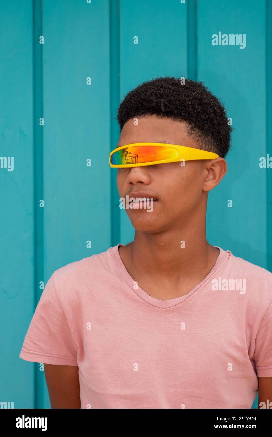 Portrait of young boy with futuristic looking sunglasses Stock Photo