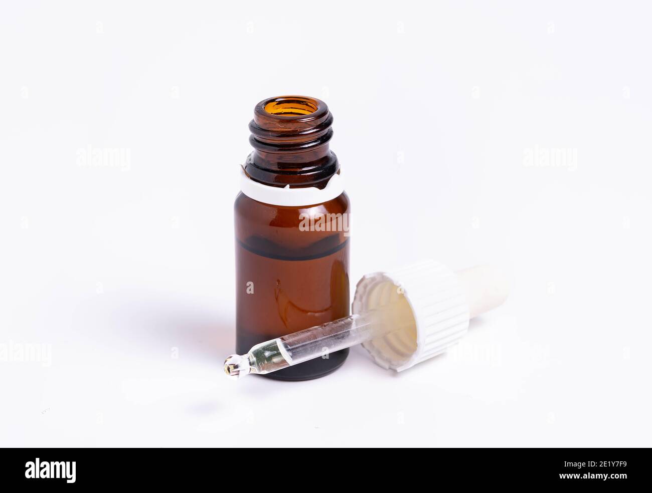 isolate, glass vial with pipette on white background Stock Photo