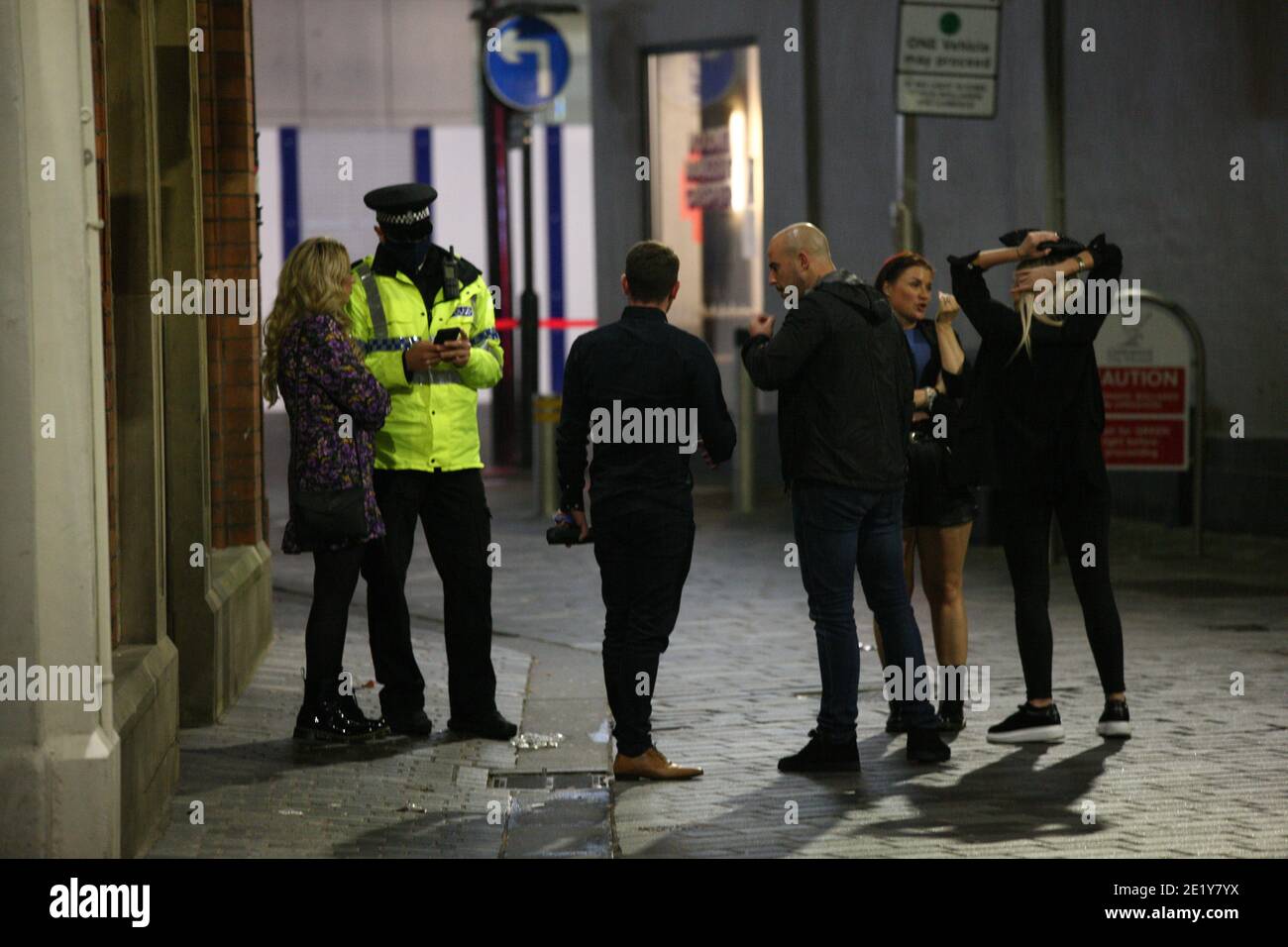 Liverpool, UK - October 10 2020: Police talk to people in Liverpool on the last weekend before stricter lockdown measures are expected across the north. Stock Photo