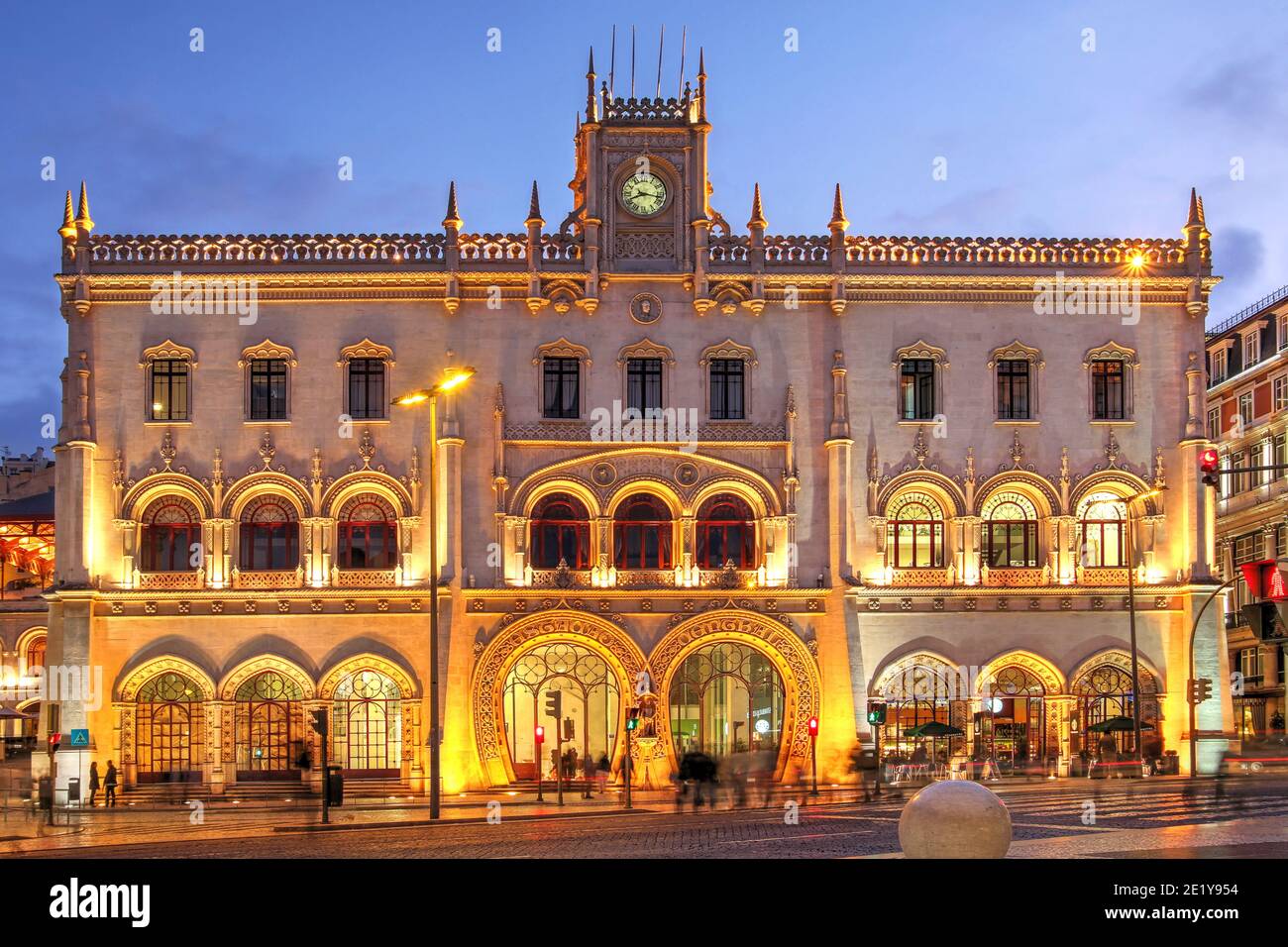 Build in the 19th century in Neo-Manueline architectural style and featuring two moorish-style horseshoe portals, the Rossio Railway Station is surely Stock Photo