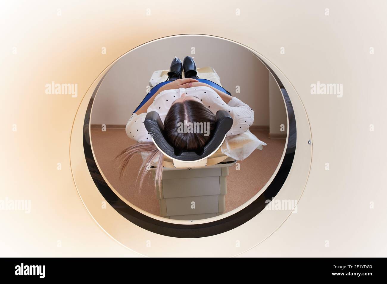 Female patient undergoing MRI resonance imaging in Hospital