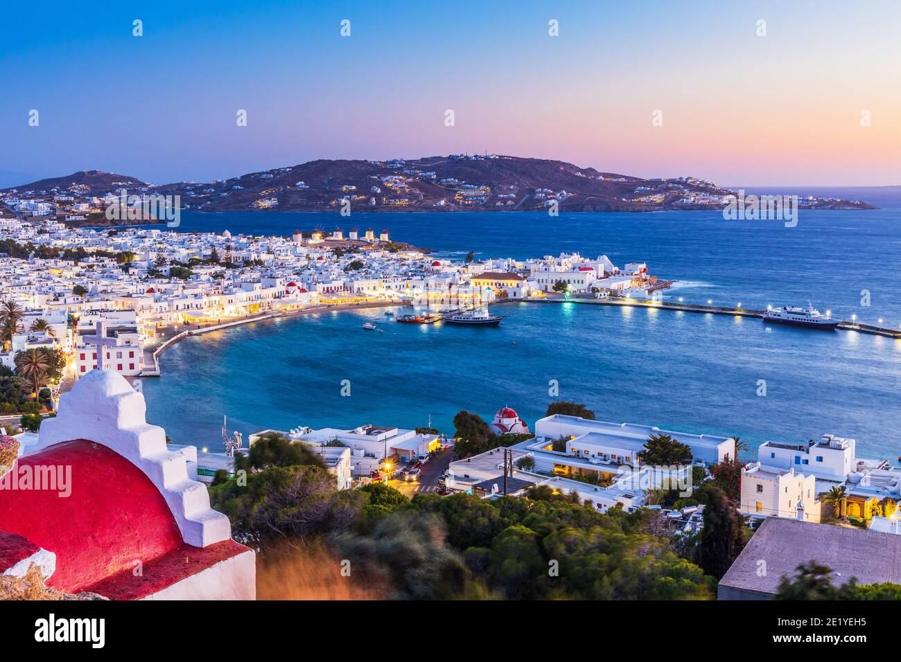 Mykonos, Greece. Panoramic view of Mykonos town, Cyclades islands at sunset. Stock Photo