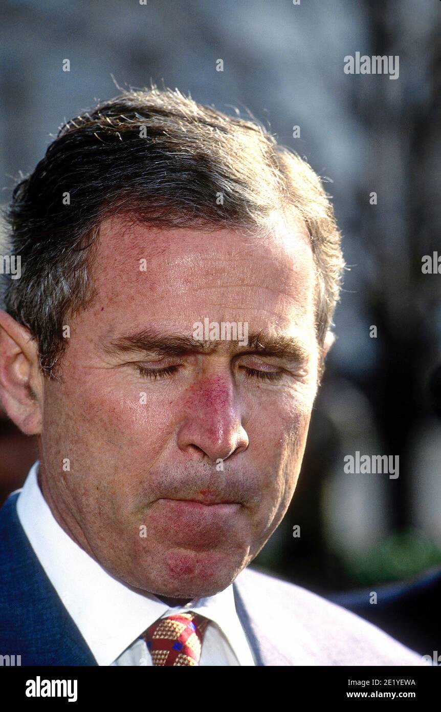 Washington DC USA, February 3,1997 Governor George W. Bush Republican from Texas talks with reporters in the West Wing driveway of the White House after attending the National Governors Association meeting with President William Clinton in the East Room of  the White House Stock Photo