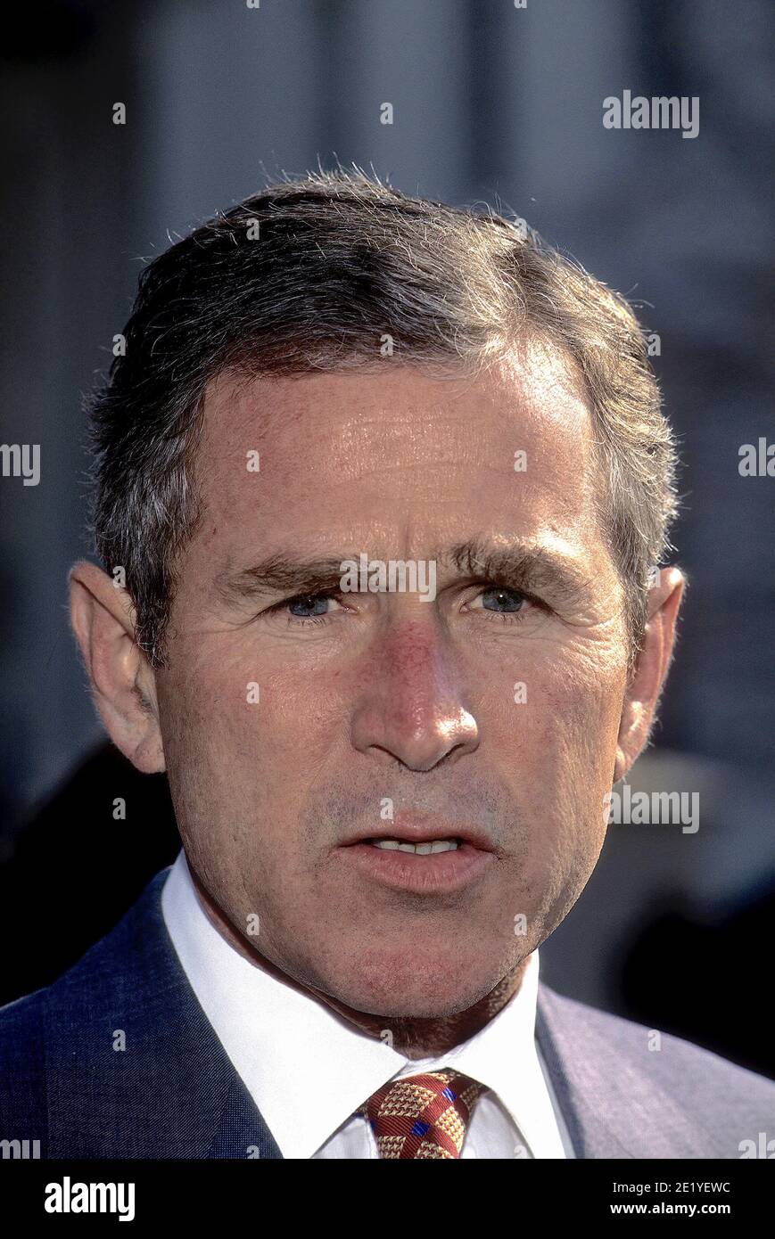 Washington DC USA, February 3,1997 Governor George W. Bush Republican from Texas talks with reporters in the West Wing driveway of the White House after attending the National Governors Association meeting with President William Clinton in the East Room of  the White House Stock Photo