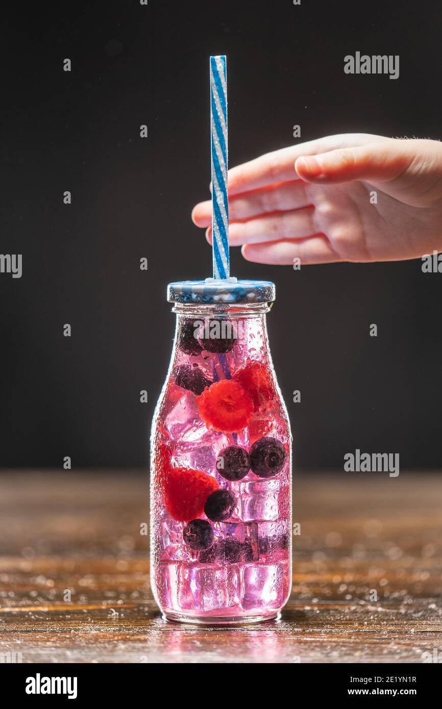 Fruit infuser water bottle with straw and fruits Stock Photo Alamy