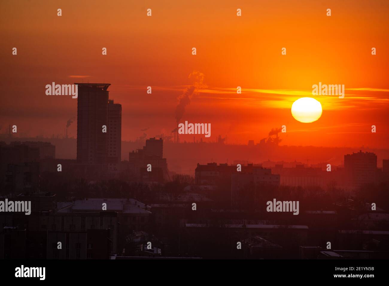 City red dramatic sunset skyline, aerial view on buildings Stock Photo