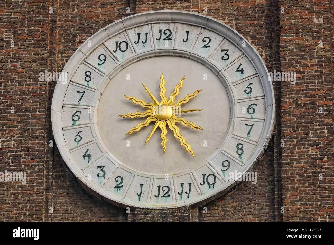 Clock on the bell tower of the Church of the Holy Apostles of Christ in Venice, Italy Stock Photo