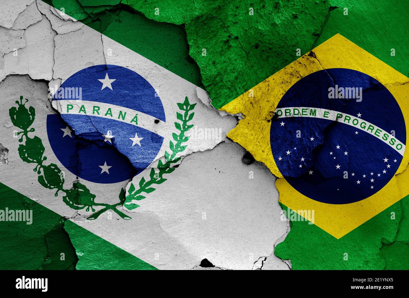 flags of State of Parana and Brazil painted on cracked wall Stock Photo