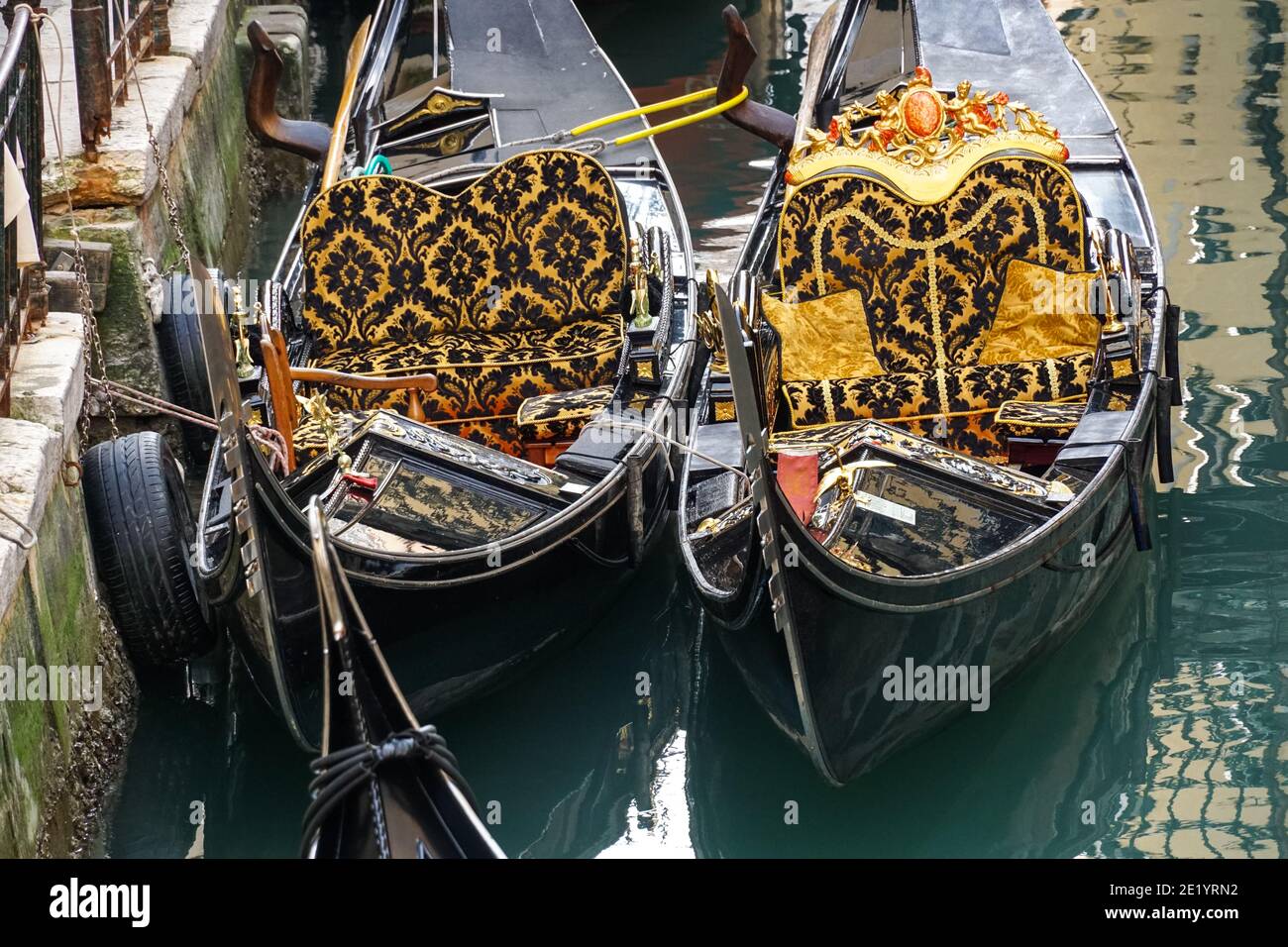 Traditional gondola, gondolas on canal in Venice
