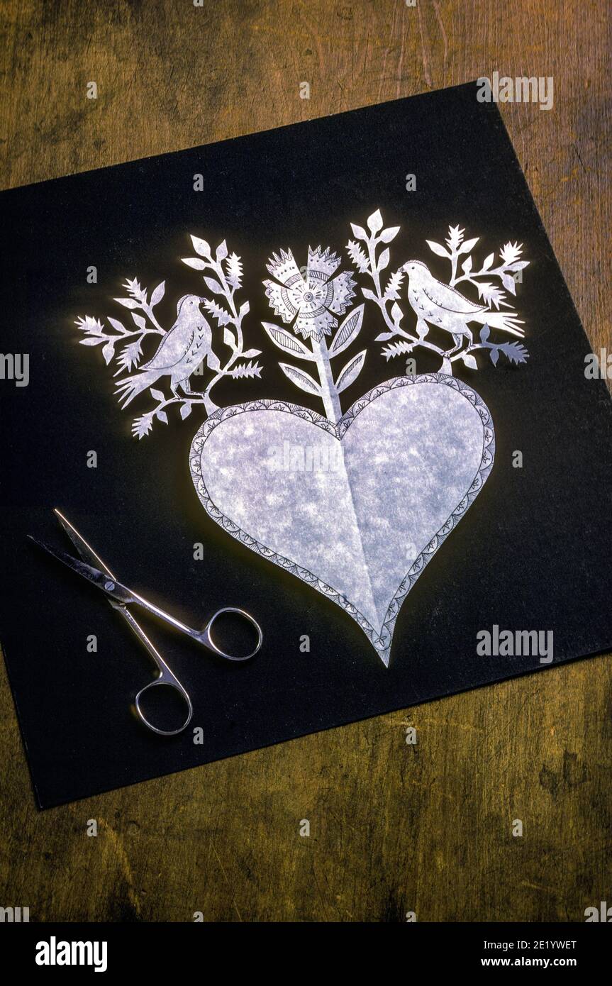 Scherenschnitte which means scissor cuts in German is the art of