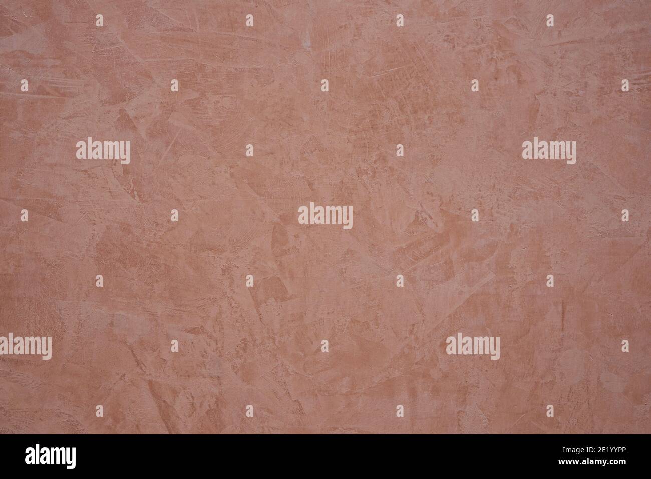 ochre colored stucco background with abstract drawings Stock Photo